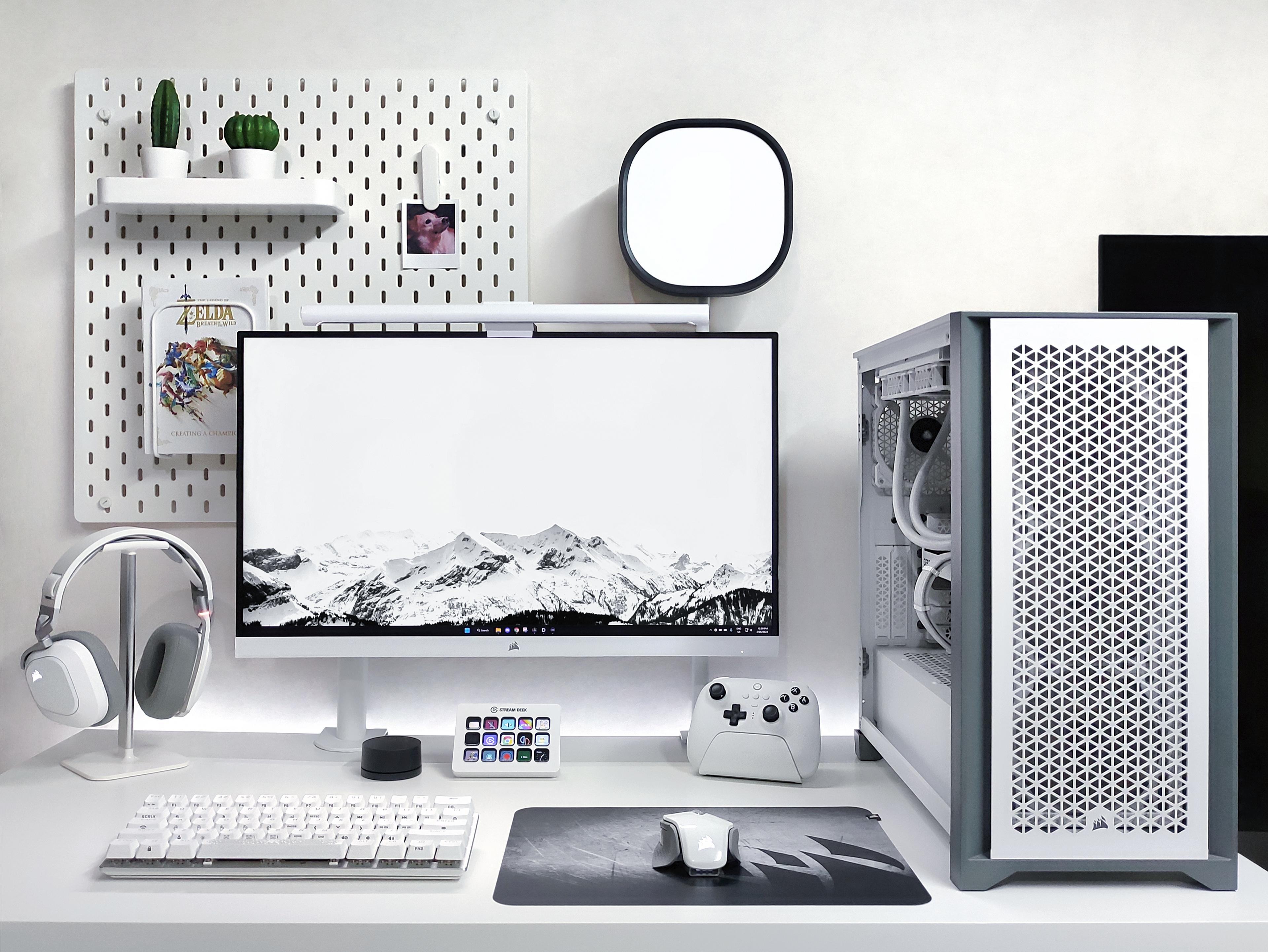 A professional editing workstation with multiple glowing visual displays